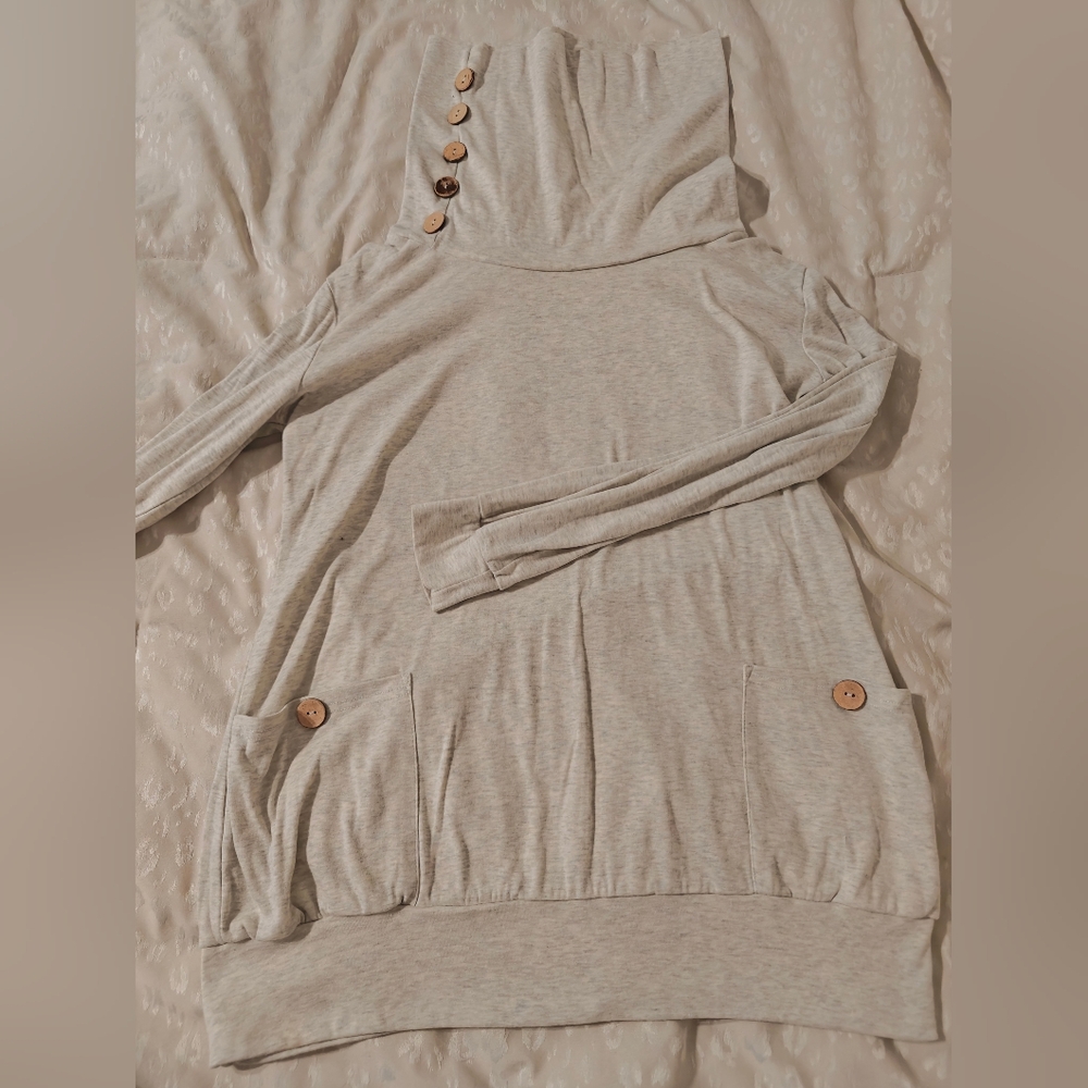 Cowl neck top. Button detail